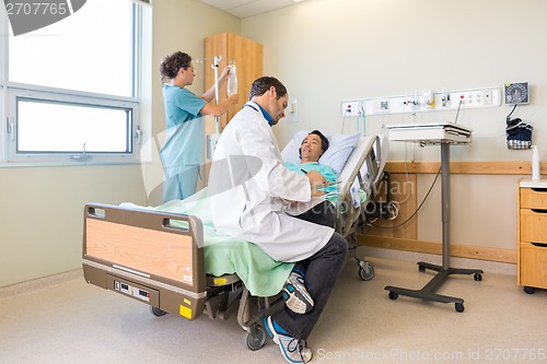 Image of Medical Team And Patient In Hospital