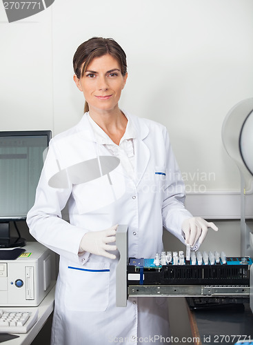 Image of Researcher With Samples For Coagulation Analysis In Lab