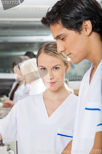 Image of Confident Researcher With Colleague