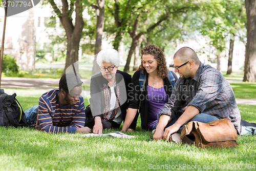 Image of College Professor Helping Students