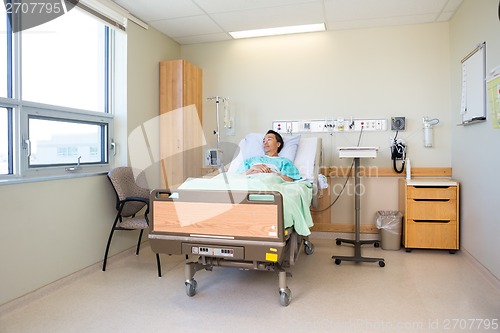 Image of Male Patient Lying On Bed In Hospital