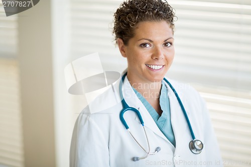 Image of Confident Female Cancer Specialist Smiling At Clinic