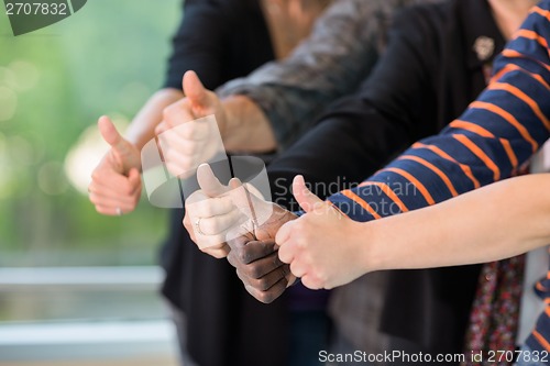 Image of Multiethnic University Students Gesturing Thumbsup