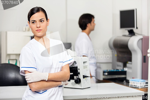 Image of Female Scientist Looking Away In Lab