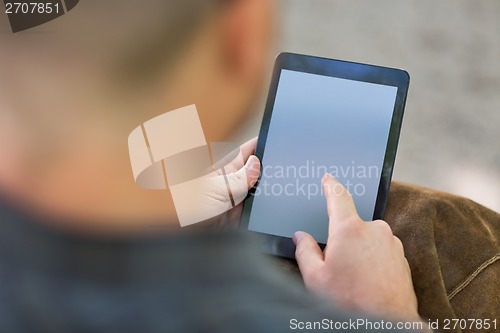 Image of University Student Using Digital Tablet