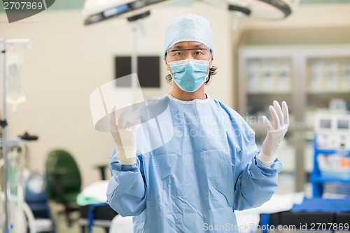 Image of Doctor In Surgical Gown in Operation Room