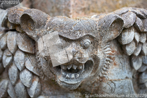 Image of Muzzle fantastic beast on the wall of an old Indonesian temple