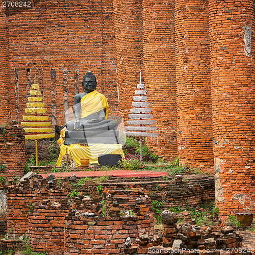 Image of Old Buddha statue in temple ruin. Ayuthaya, Thailand