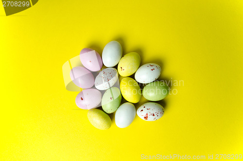Image of Easter eggs candy at yellow 