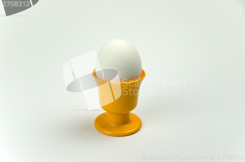 Image of Egg in yellow egg cup