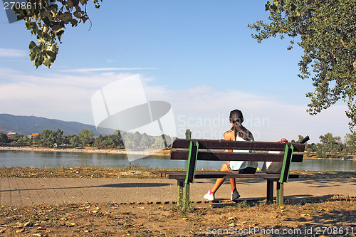 Image of Girl on bench