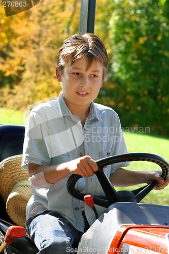 Image of Child on a small tractor