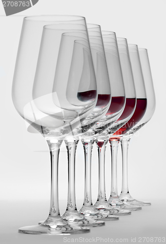 Image of wine glasses in a row