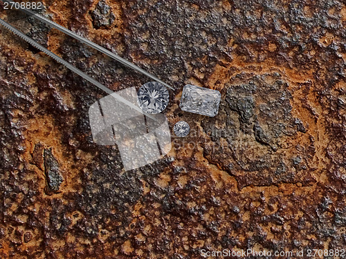 Image of diamonds over rusty plate