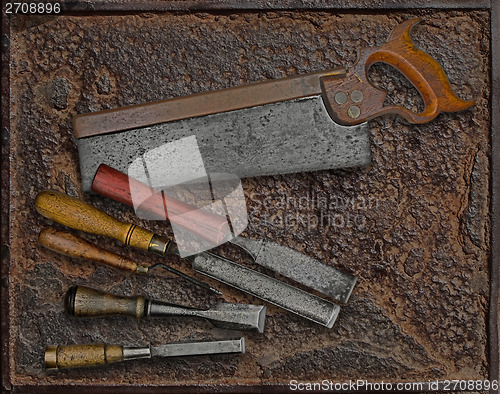 Image of vintage woodworking tools over plate
