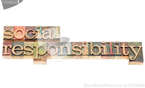 Image of social responsibility in wood type