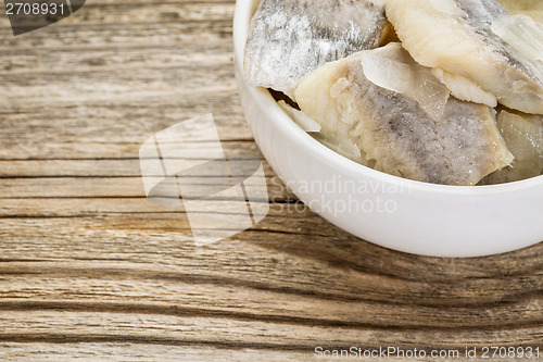 Image of herring in wine sauce 