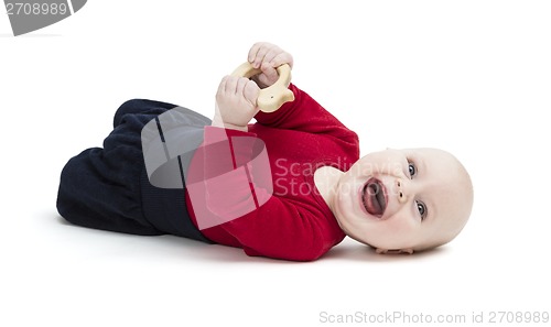 Image of happy toddler laughing on floor