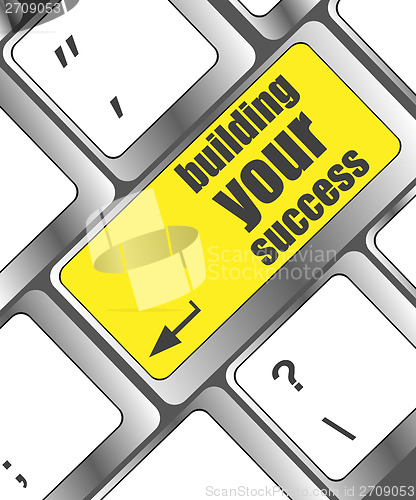 Image of building your success words on button or key showing motivation for job or business