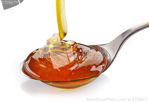 Image of pouring honey