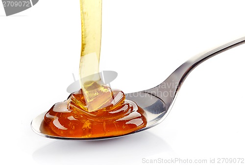 Image of pouring honey