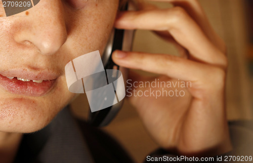 Image of Woman speaking on cellphone