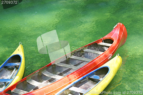 Image of Three plastic canoe