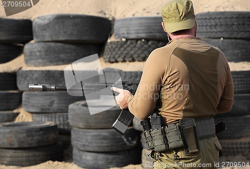 Image of  Shooter with a Kalashnikov assault rifle