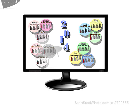 Image of colorful calendar for 2014 year on the monitor