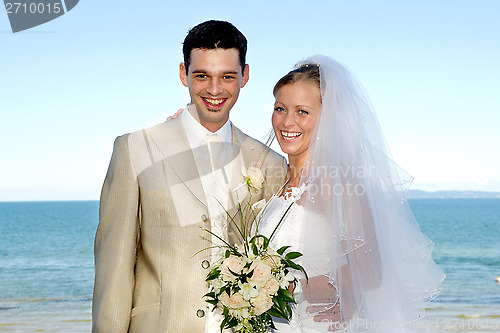 Image of Happy wedding couple smiling