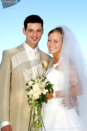Image of Happy wedding couple smiling