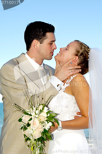Image of Happy wedding couple smiling