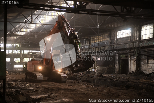 Image of Industrial interior with bulldozer inside