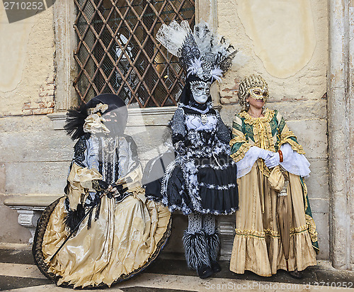 Image of Three Disguised Persons