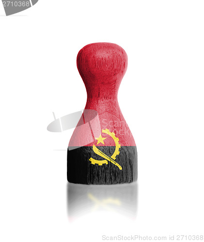 Image of Wooden pawn with a painting of a flag