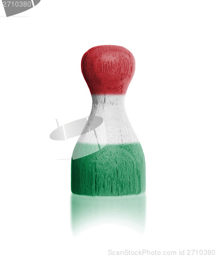 Image of Wooden pawn with a painting of a flag