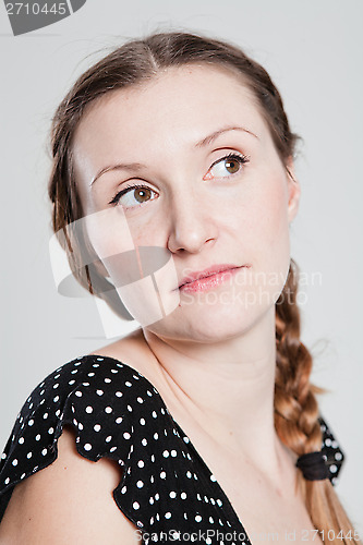 Image of Portrait of attractive woman looking to side