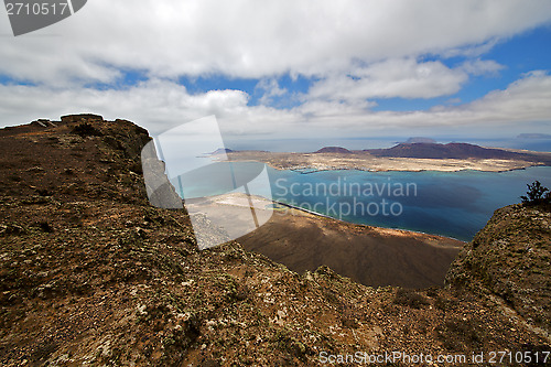 Image of harbor rock stone sky cloud beach  water  coastline graciosa mir