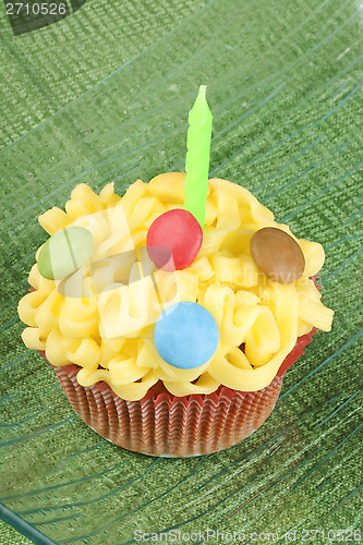 Image of Cupcake with green candle