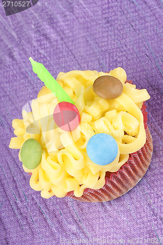 Image of Birthday cupcake with green candle