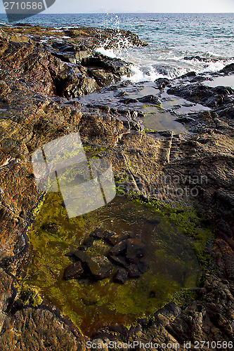 Image of in lanzarote   foam rock spain landscape  stone sky cloud beach 