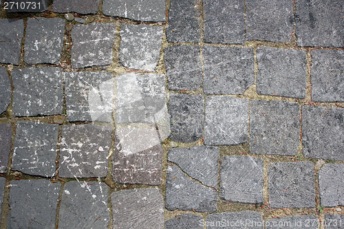 Image of distressed stone pavement