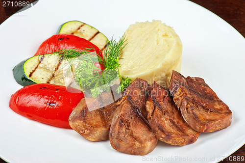 Image of tongue with grilled vegetable