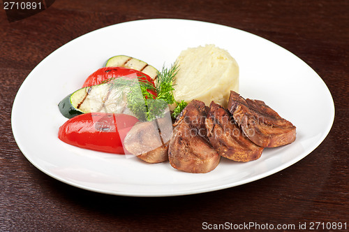 Image of tongue with grilled vegetable