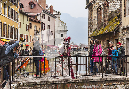 Image of Disguised Person Posing on a Bridge