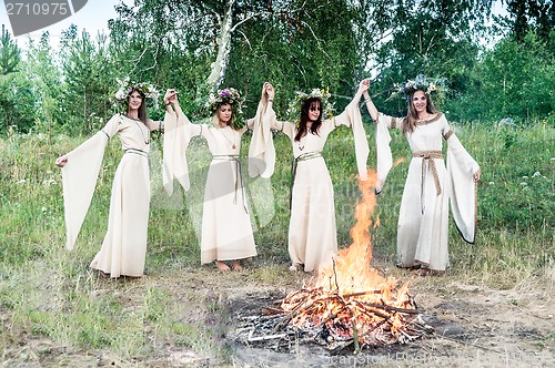 Image of Beautiful women with flower wreath