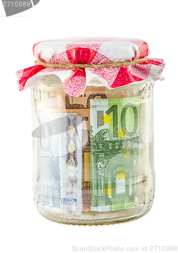 Image of saving money in glass jar