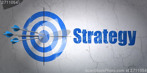 Image of Finance concept: target and Strategy on wall background