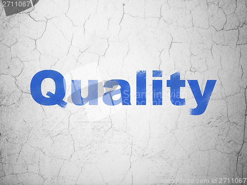 Image of Marketing concept: Quality on wall background