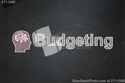 Image of Finance concept: Head With Finance Symbol and Budgeting on chalkboard background